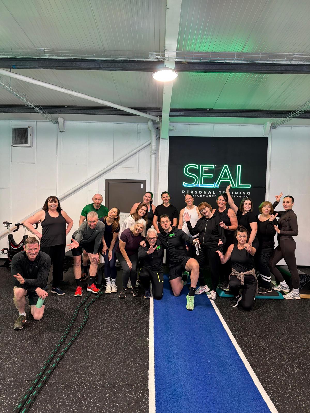 Saturday Bootcamp group under the SEAL Personal Training sign, Redditch